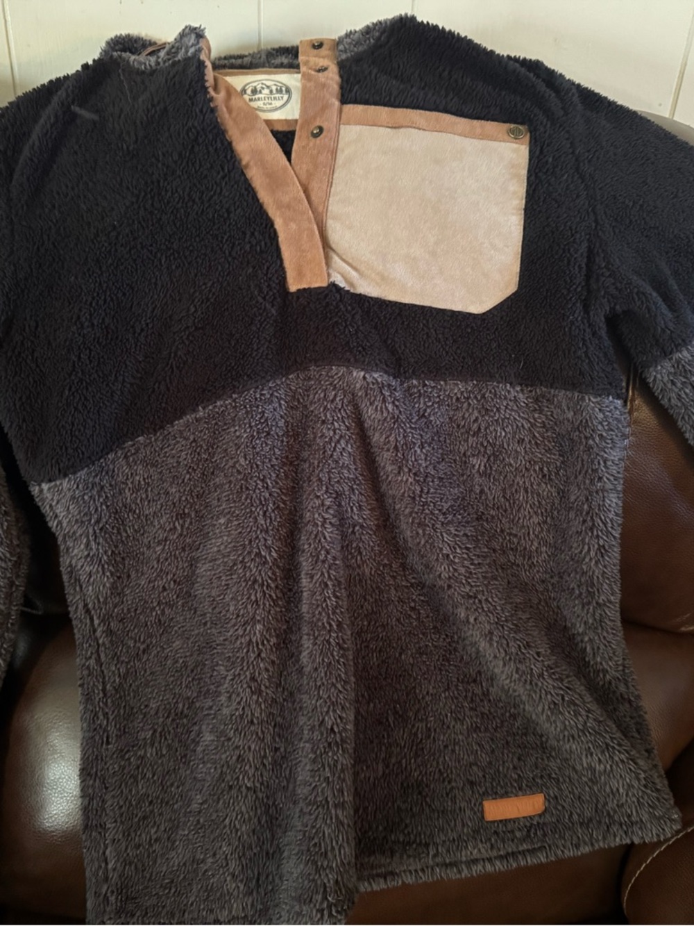 Women’s Two-Tone Black and Charcoal Sherpa Pullover with Tan Pocket